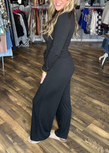 Black slinky long sleeve bodysuit with flare pants set